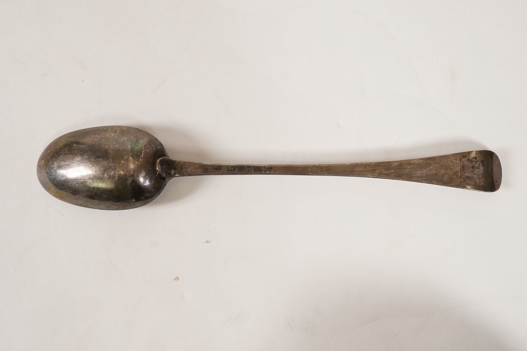 A George II silver Hanoverian pattern large basting or hash spoon